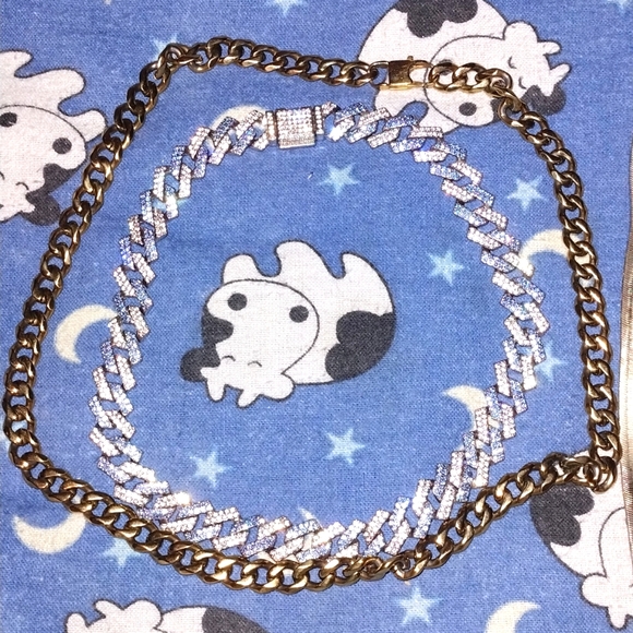 A Gold chain and blue diamond chain
